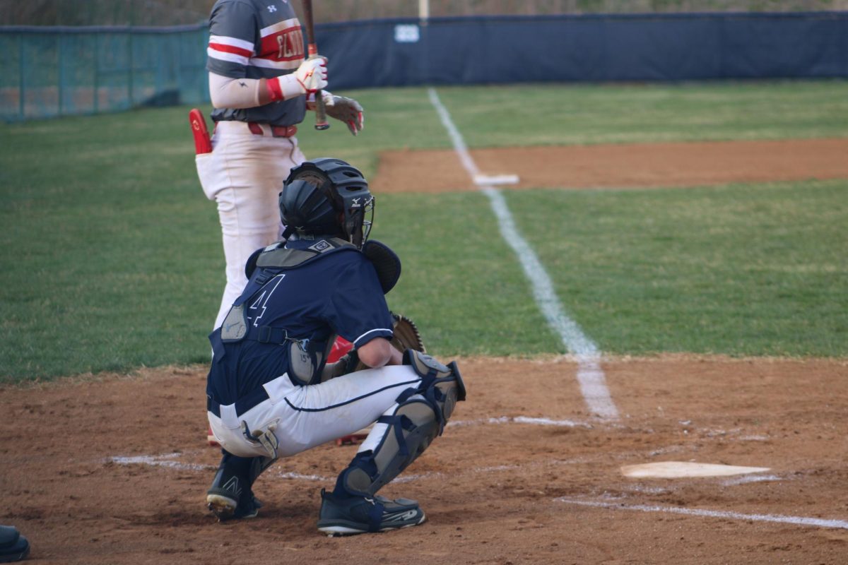 Freshman Josiah Gingerich is ready to catch the pitchers ball