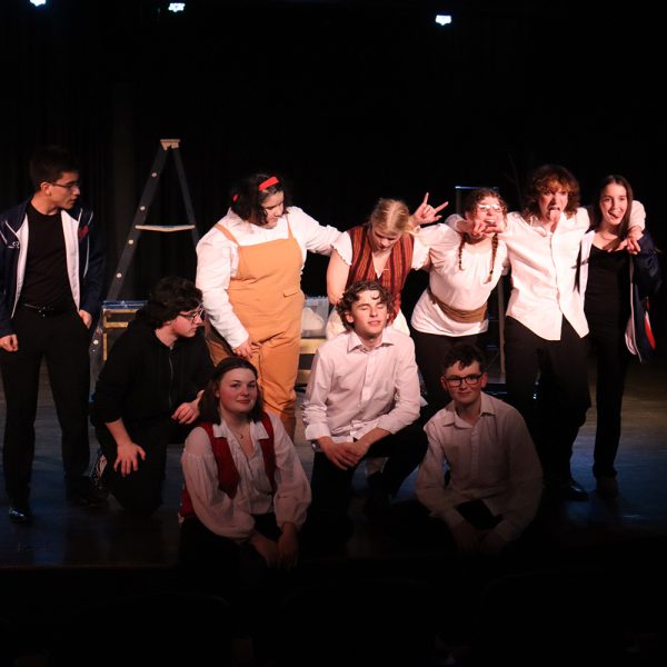 Full cast poses for photo after the show.
