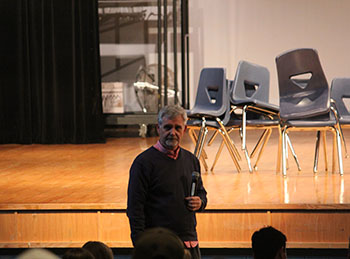 STEM guest speaker, Mr. Healy talking about what psychology is and how it works to HHS students at the STEMINARS.