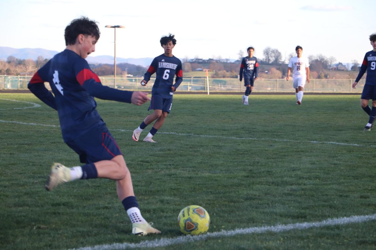 Silas Long kicking the ball