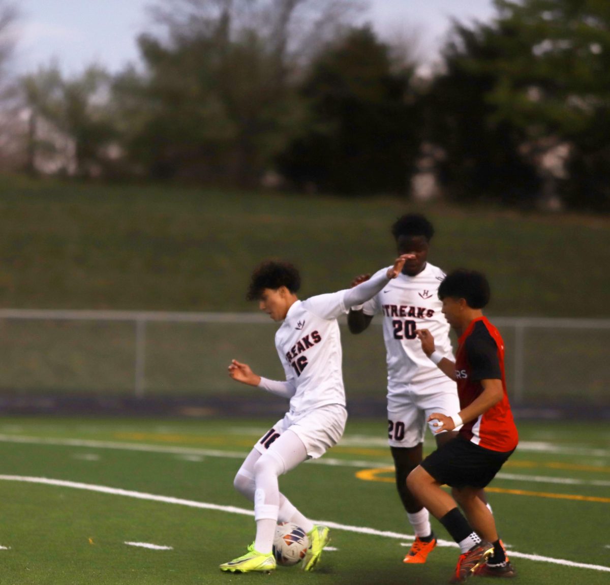 Sophomore Danny Ayala-gallegos and junior Prince Mukambirwa trying to keep the ball from the opponent 