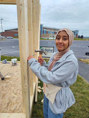 Multezem Siraj nailing the beam. " It feels great to make a difference," she smiles.