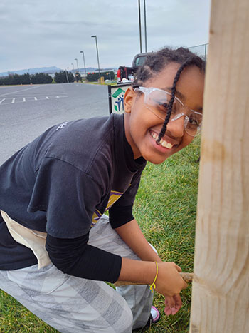 Hanna Gebru nails shed, then says "The shed I got wasn't so great, so I'll make theirs greater."