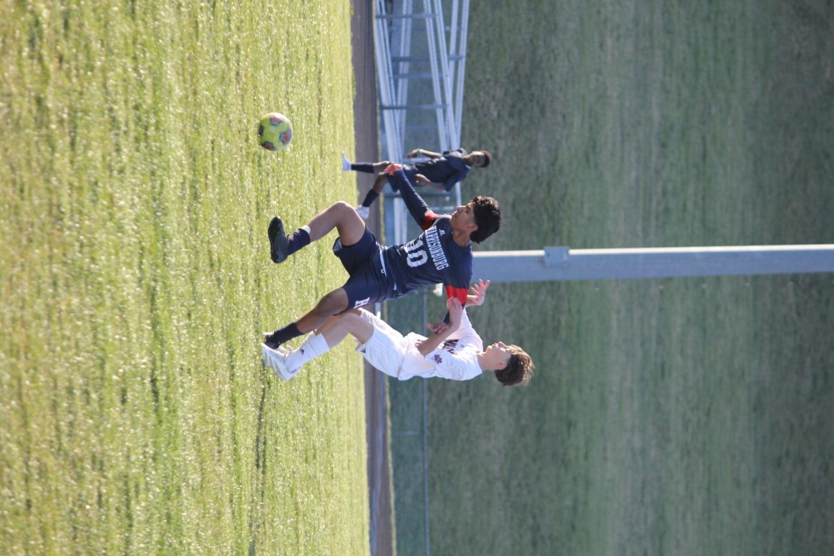  The ball at his feet, the goal in sight,  Alfredo Rivero-Rodriguez  moves with purpose and precision. Every touch tells a story of dedication, every play shows the years of training. In this moment at the HHS soccer field, the people in the stands, his teammates, opponents,and the need to win hits him. 
