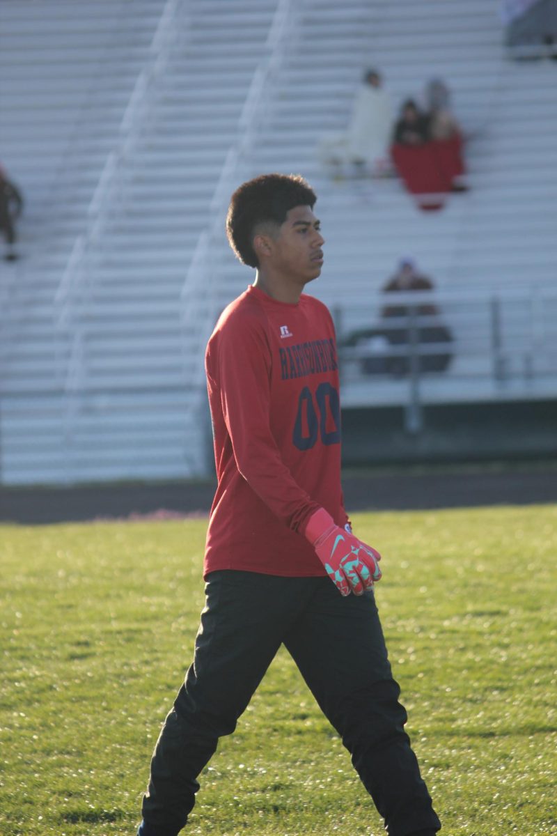 Jonathan Ortega is the goalie here at HHS. After his first half full of saves and shutouts, Ortega walks to his teammates, focused and determined  in every step.  Ortega is a sophomore who has improved greatly since last year and works his hardest until the end. 