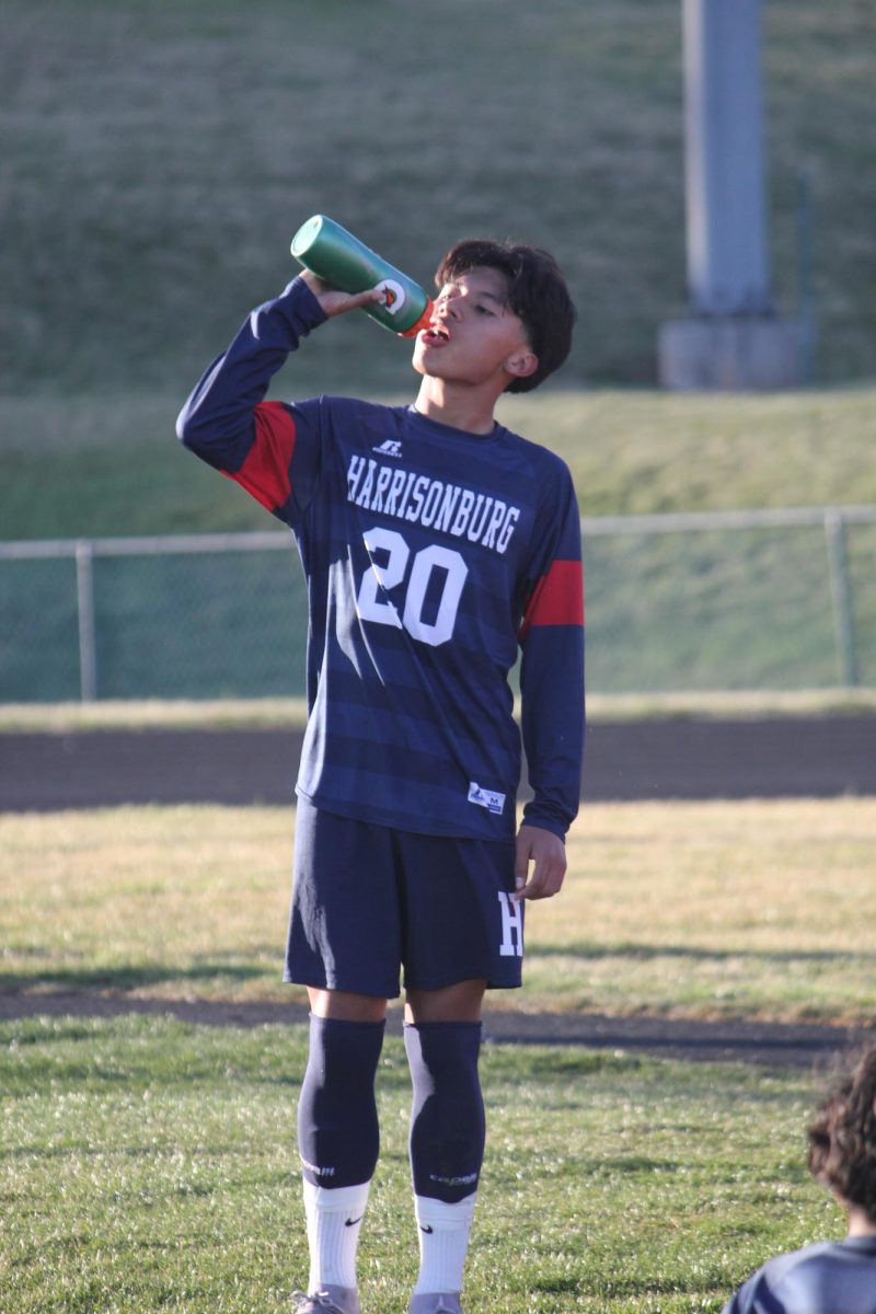 With determination in every step,   Andy Mendoza Flores is giving his all on the field. Whether it's making passes or chasing down the ball, he proves that he deserves his spot on the JV Soccer team. Mendoza Flores is a hard worker who always gets the job done and hustles and tries his best through every battle. While its half time he's focused and ready to get back in the game.