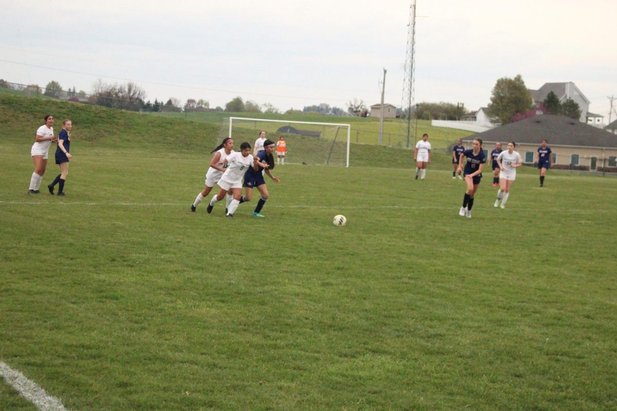 Streaks running to the ball to keep it in their possession.