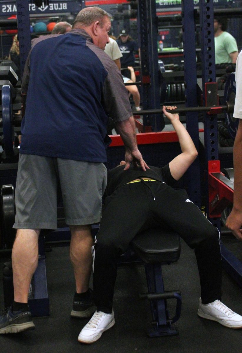 Fernando Martinez is working hard with the help of his teacher, that is also his football coach.