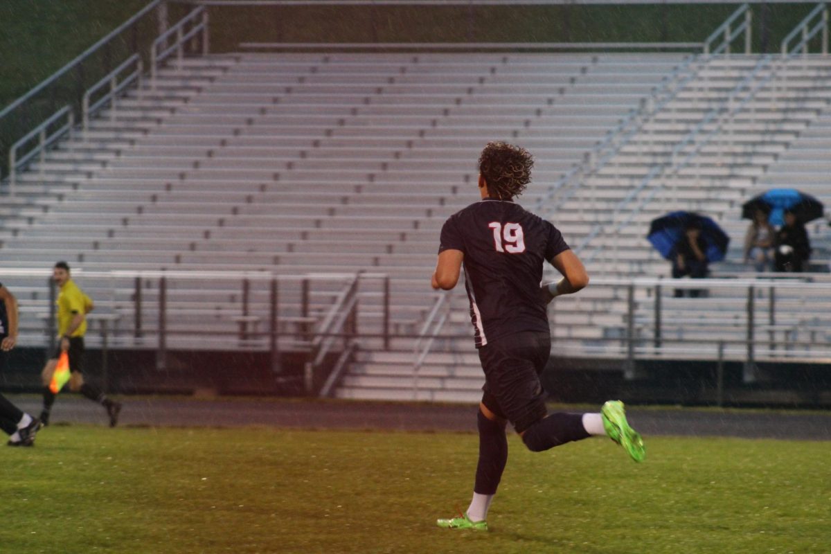 Senior Rayyan Garout runs down the field.