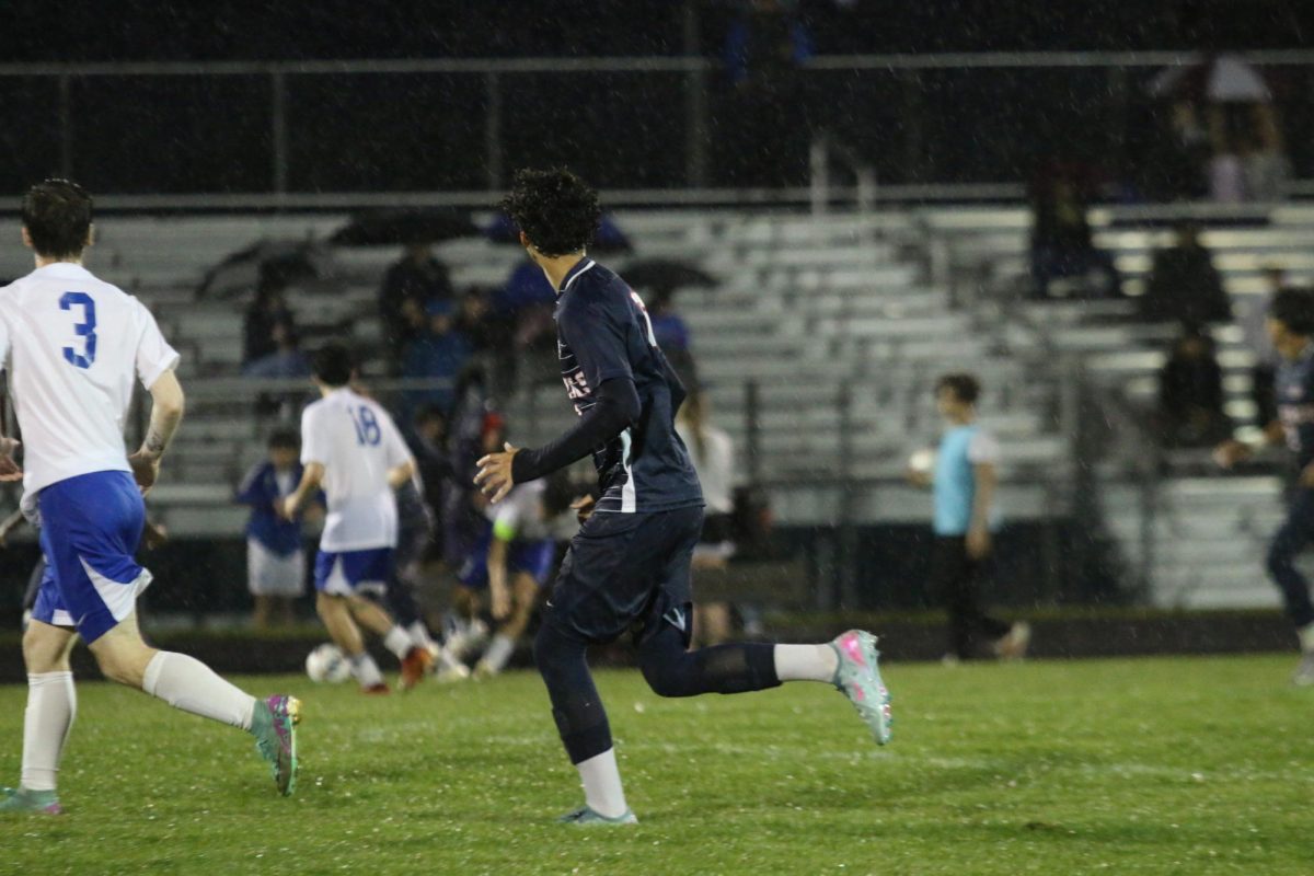 Sophmore Danny Ayala-gallegos is seen running to get the ball.
