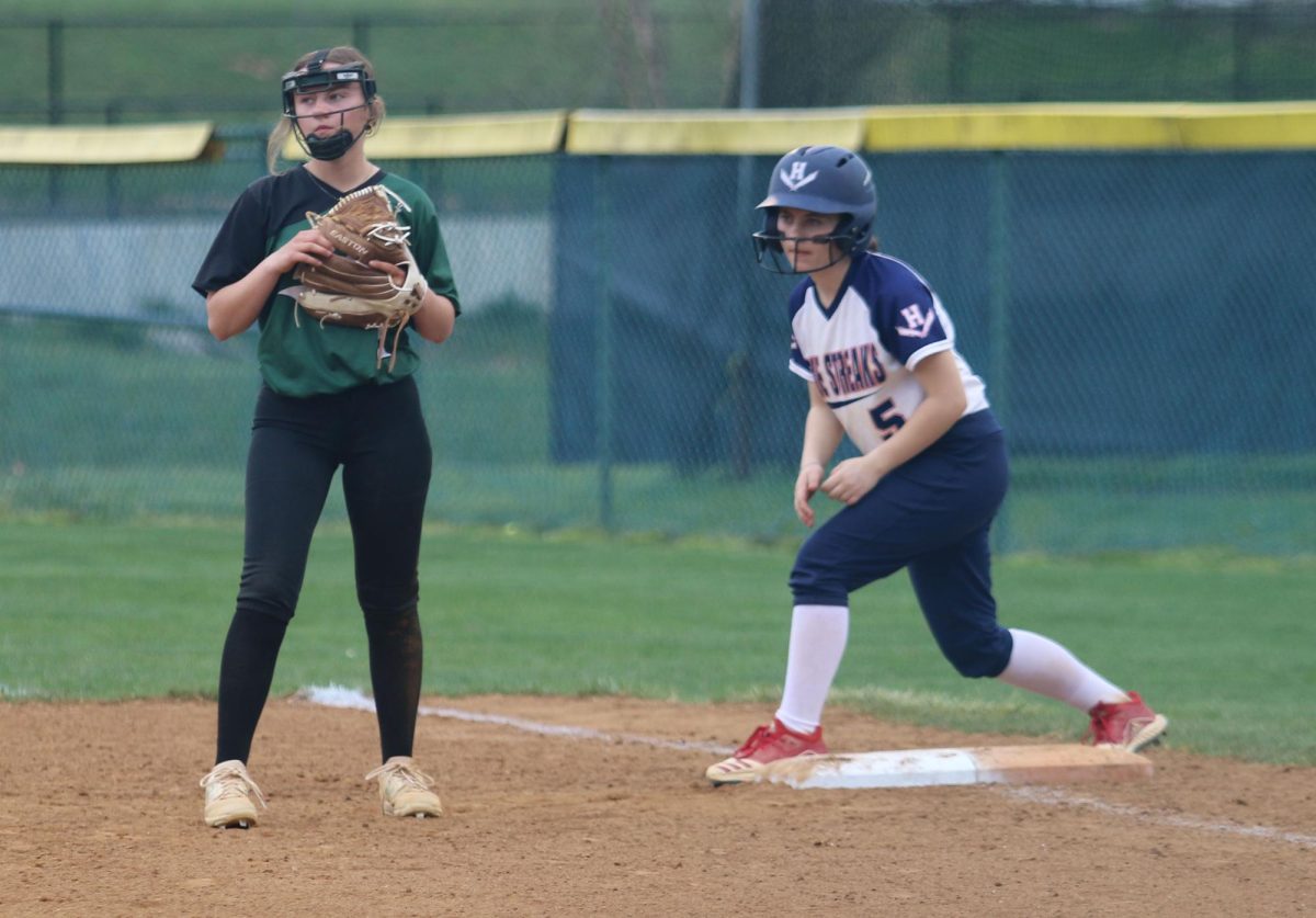 Eighth grader Mary Howley gets ready to run to 2nd. base