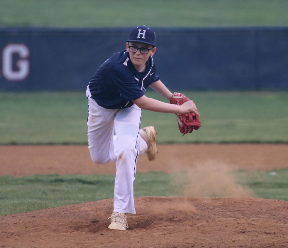 Sophomore Shea Gibson pitches the ball