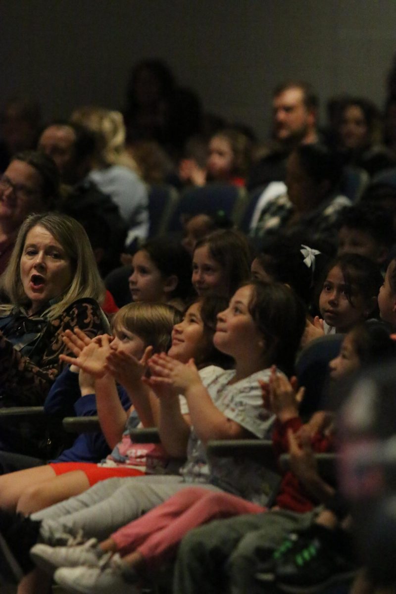 Elementary students watching the Tiny Tots performance. "Seeing the Elementary students reactions to the concert especially with the genie was just super fun".-Gram Vass.