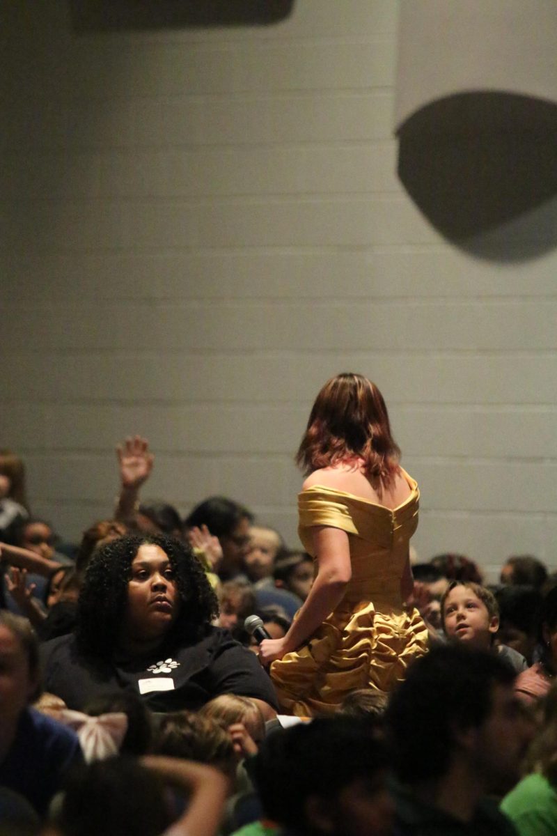 Abby Bloss singing to the tiny tot students as Belle. "I love playing Belle from Beauty and The Beast, its really cool".
