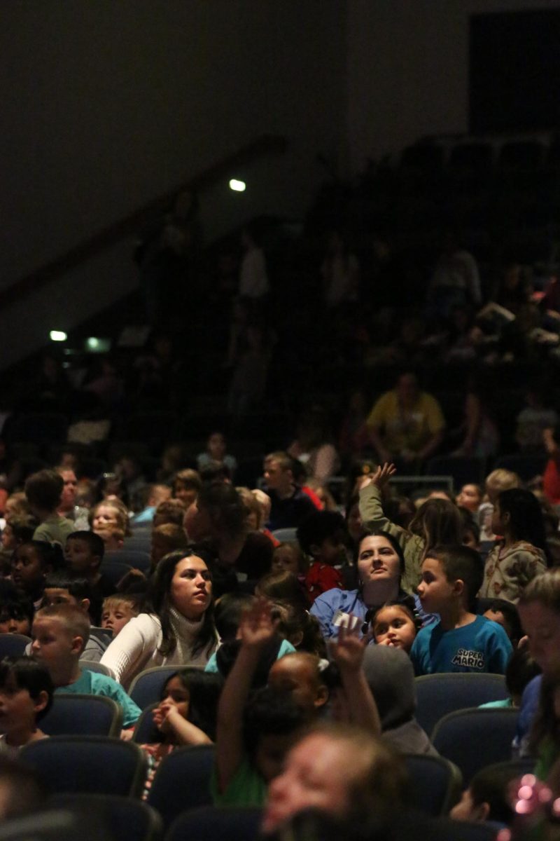 Elementary students watching the Tiny Tots performance."Its really a great experience for both the high school students and the elementary students".- Daniel Upton.