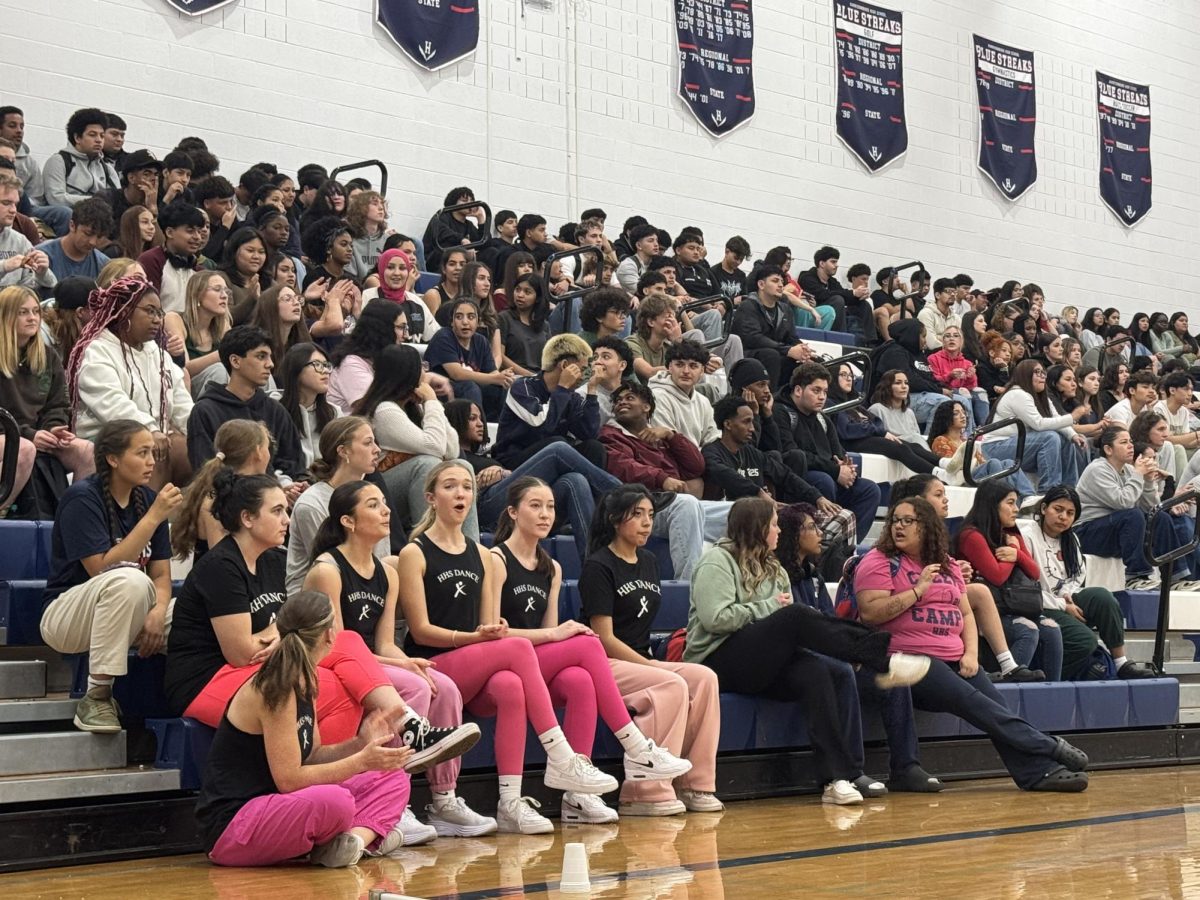 Junior class watching the games during the spring pep rally.