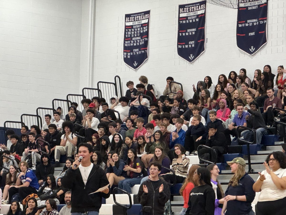 SCA President, Gabe Sabarre, hosting games during spring pep rally.