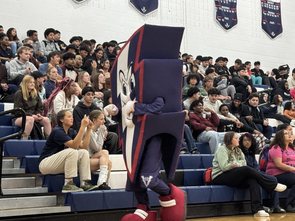 HHS Mascot, Bolt, bringing up the vibes by going arounf giving everyone high-fives during the spring pep rally. 