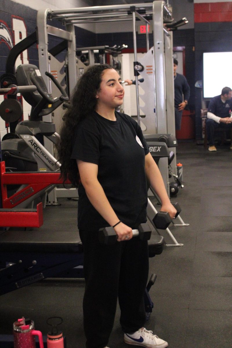 Sara Hussein lifting dumbells. "Exercising clears my mind and keeps me feeling ready for whatever comes next".