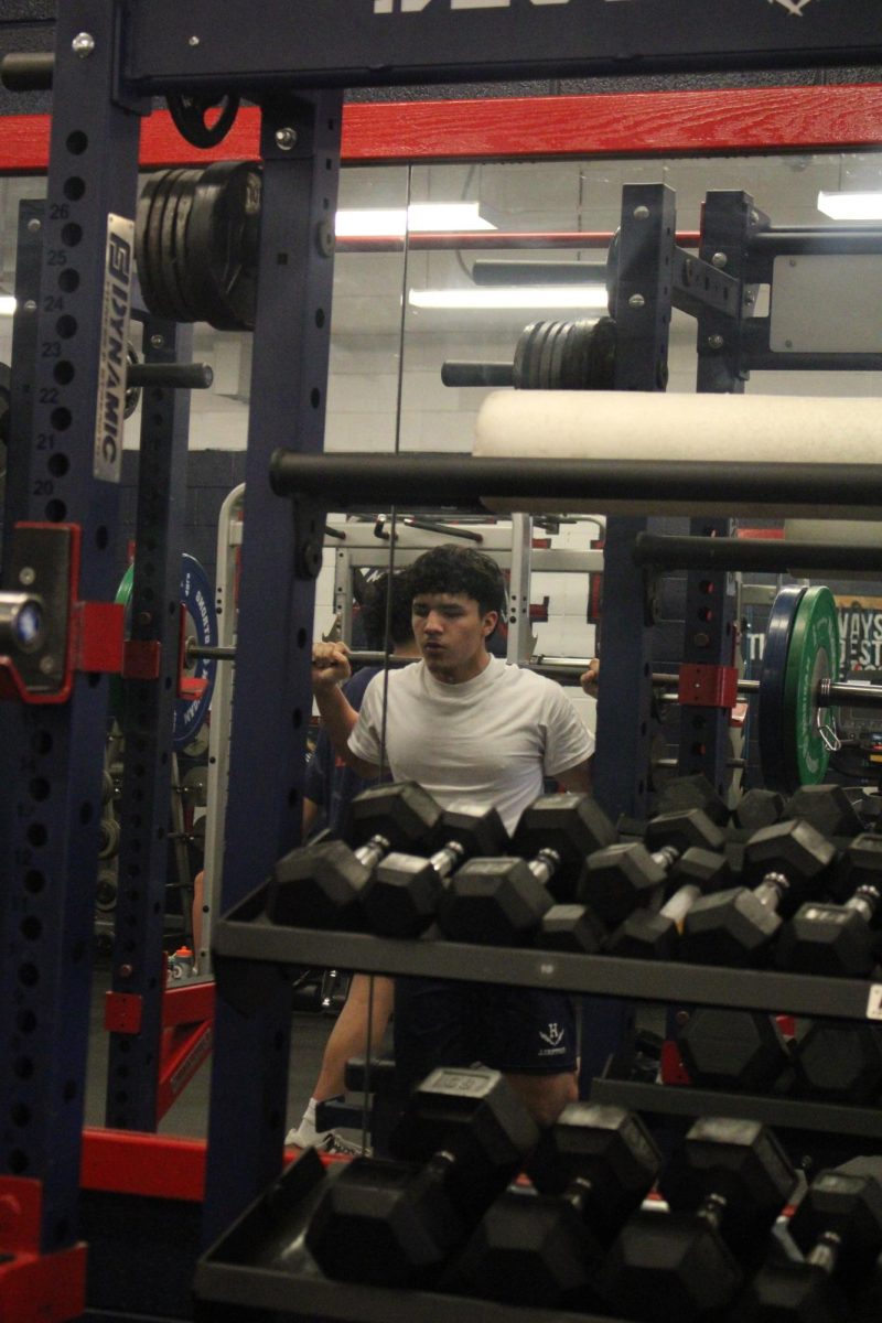 Fernando Rodriguez pushing through the heavy weights."Weightlifting pushes me to be better every day.