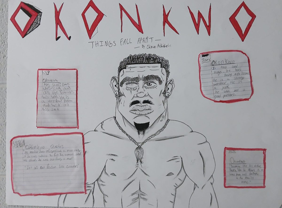 Next, we have another poster featuring the same character, Okonkwo, from "Things Fall Apart" by Chinua Achebe. This poster was created by a different group of students, showcasing their unique artistic style and interpretation of the character. Daniel Carranza humorously remarked, “I personally think ours is the best out of all of them. I mean, look at it! It belongs in a museum.”