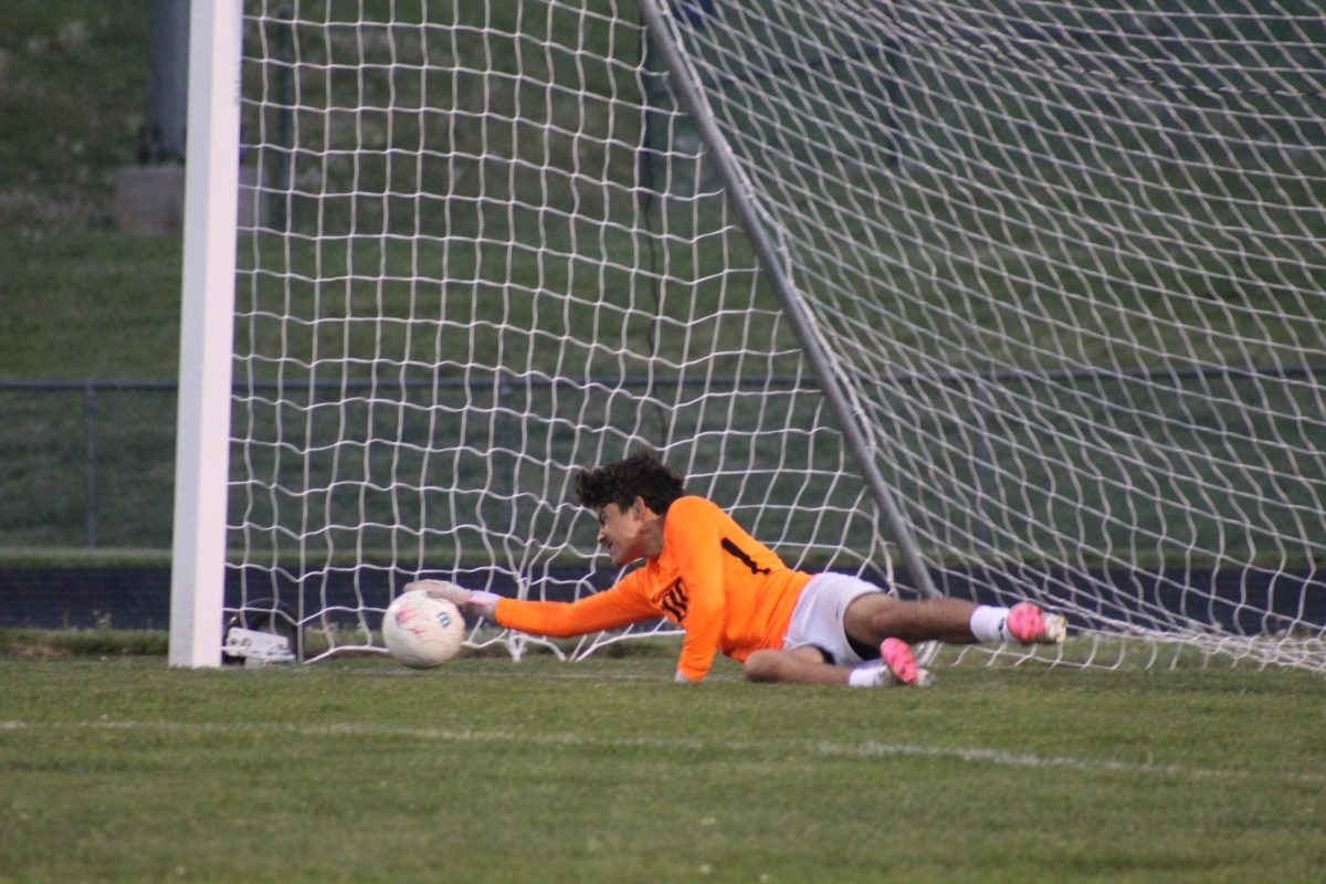 Senior Adolfo Rivera catches the ball during practice.