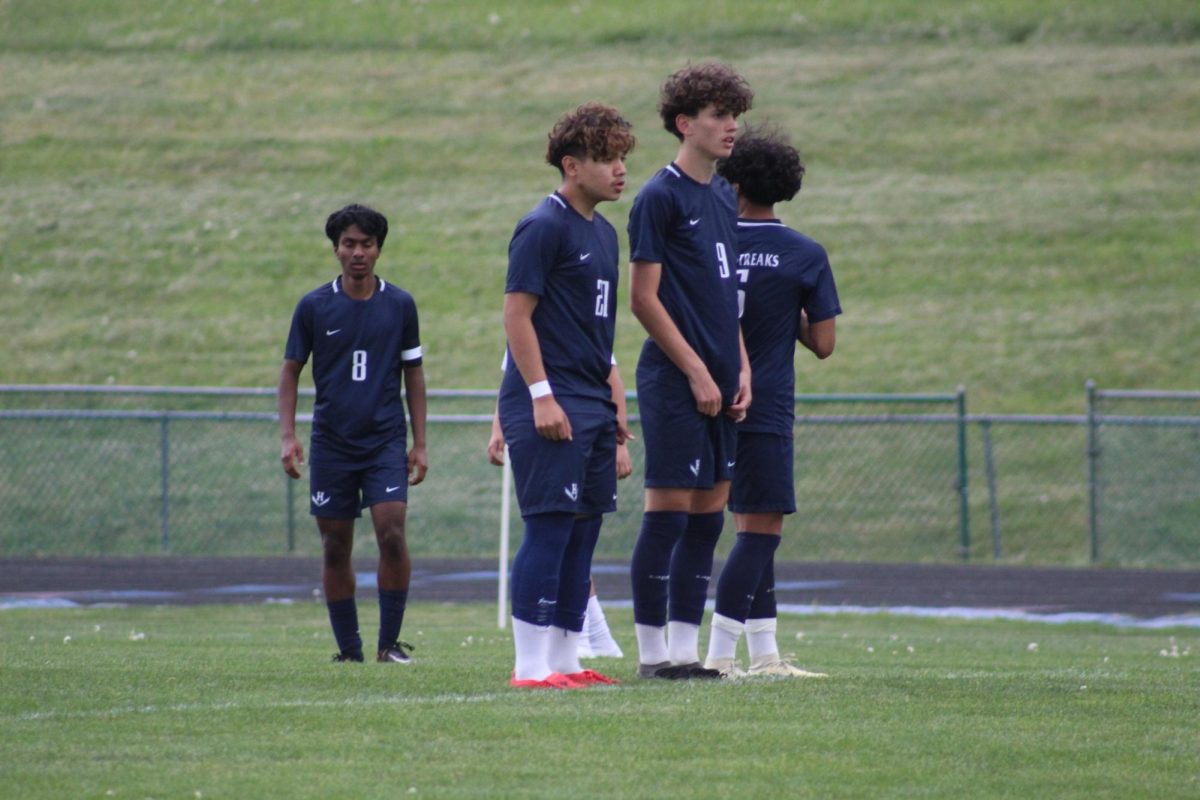 Sophomore Jeferson Rivera, Eighth grader Leo Kurtz, & Eighth Grader Michael Hernandez prepare to block a free kick.