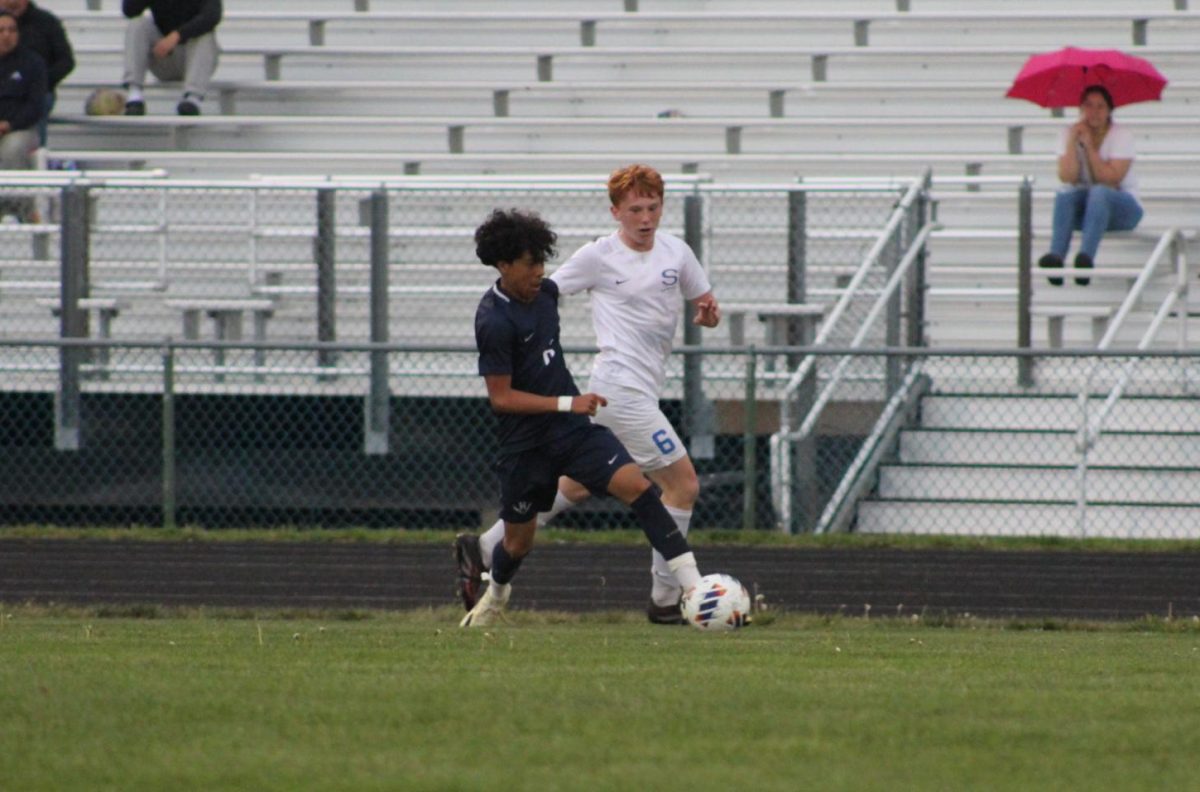 Eighth grader Michael Hernandez attempts to get the ball back. 