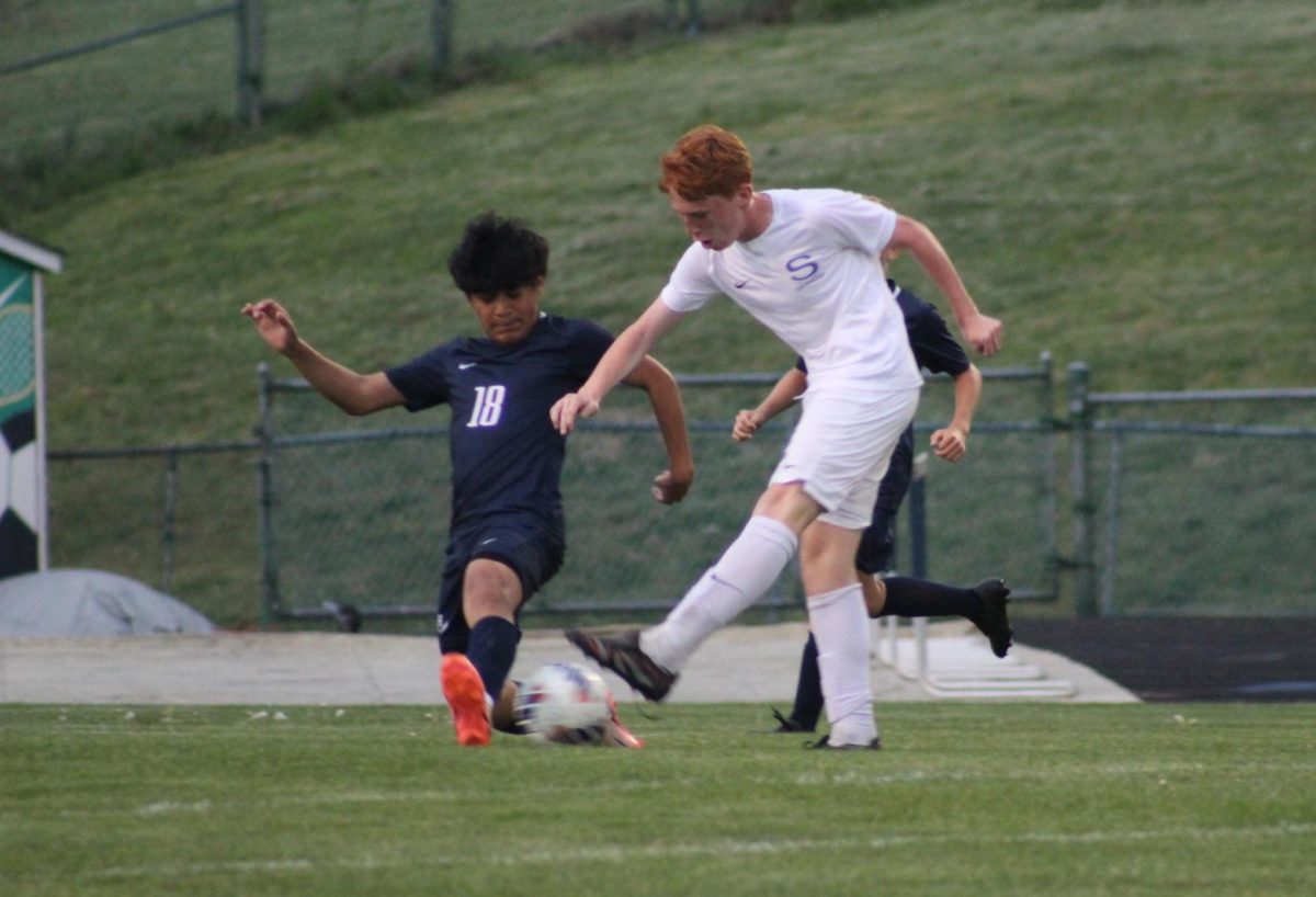 Sophomore Josue Sontay intercepts with the opponent. 