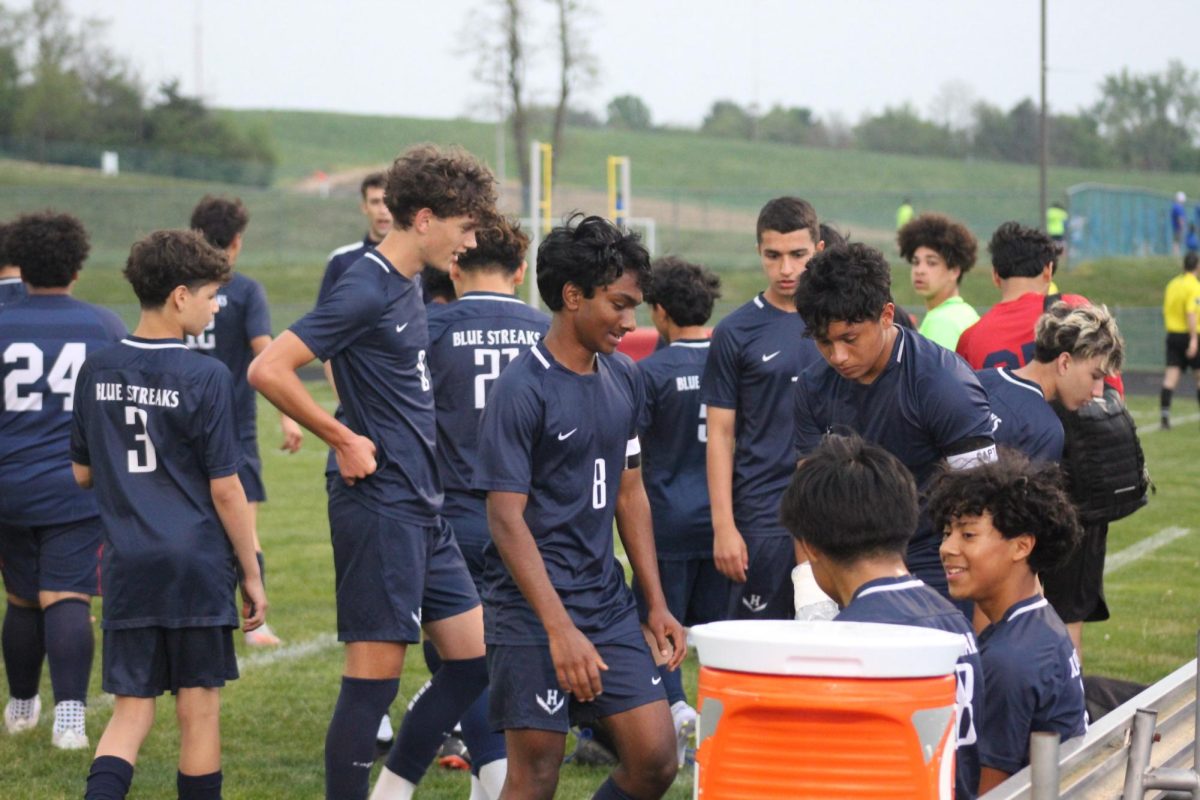 JV boys soccer team takes a short break. 
