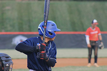 Junior Diego Pichardo Encarnacion has his eyes on the ball, ready to make the next pitch count.