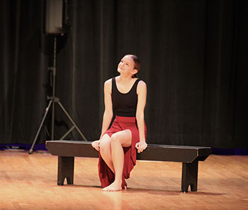 Senior Lili Gengrich performing during the roots run deep show wednesday night, April 16 at Harrisonburg High School.
