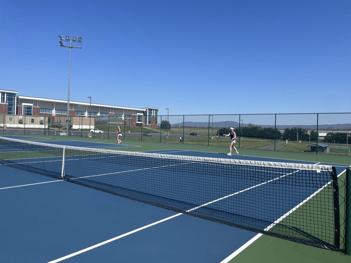 Sophomore Nora Von Rotz swings the  ball back with her forehand.