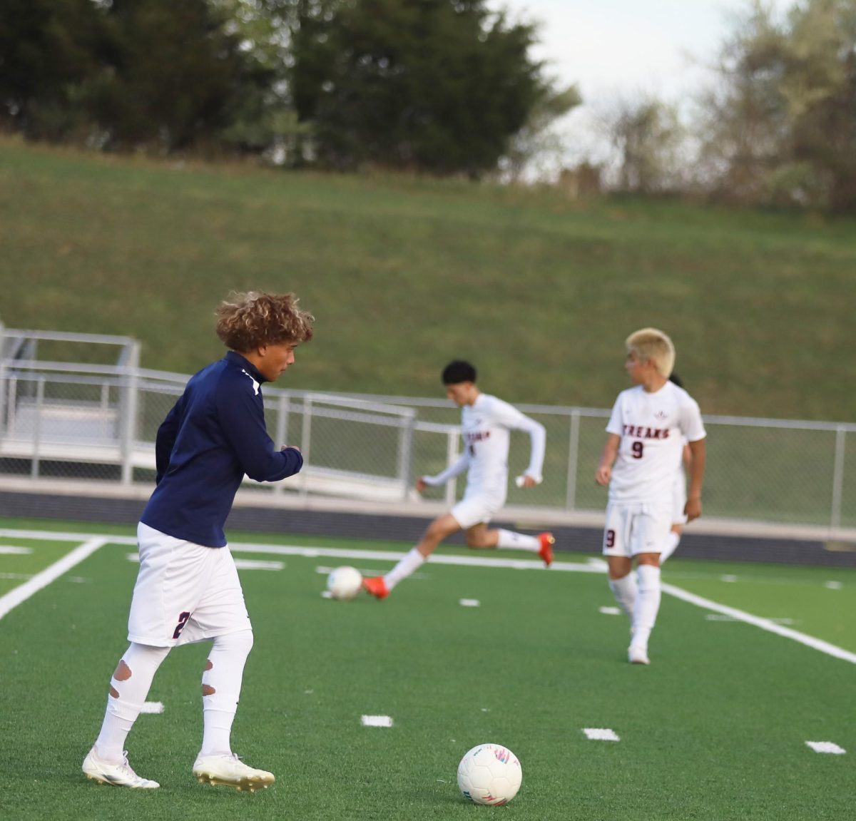 Junior Kaidan Velasquez warming up for the game 