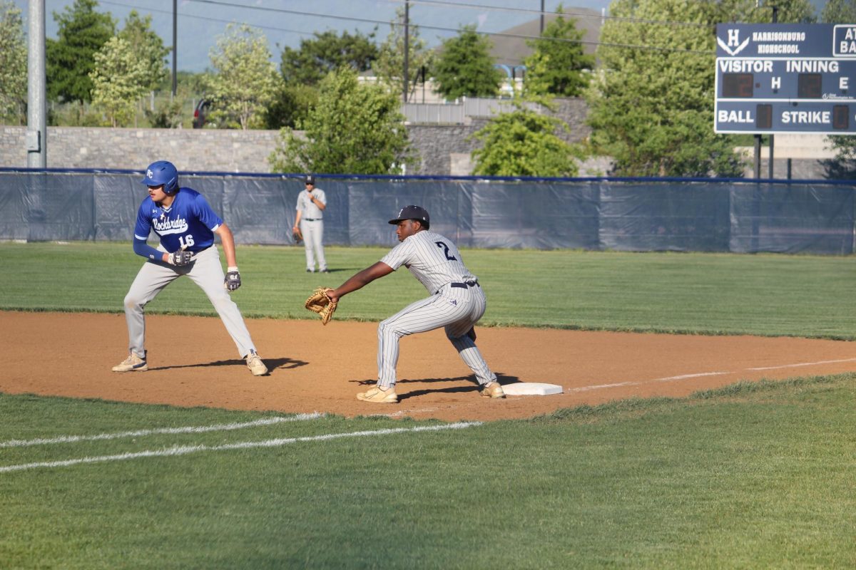 On a crucial play at first, senior, Mason Smith stretches to make the out. Quick reflexes and a steady glove turn tough throws into easy outs. He anchors the right side of the infield with confidence and consistency.