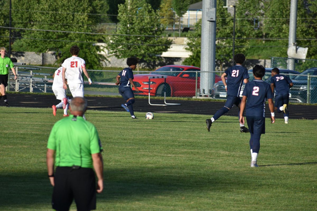 Senior Temesgen Habtemicheal chasing the ball.