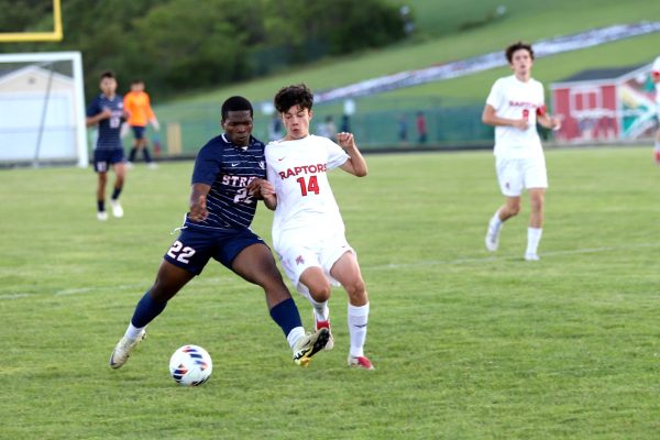 Junior Eritier Eca tries to get past a defender.