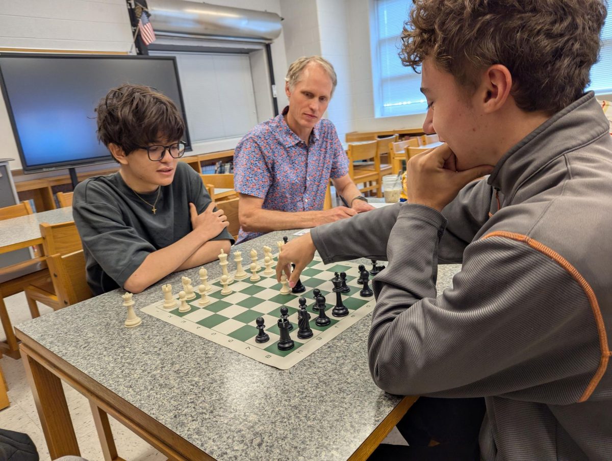 Sophomore Daniel Marusich plays an opening move.