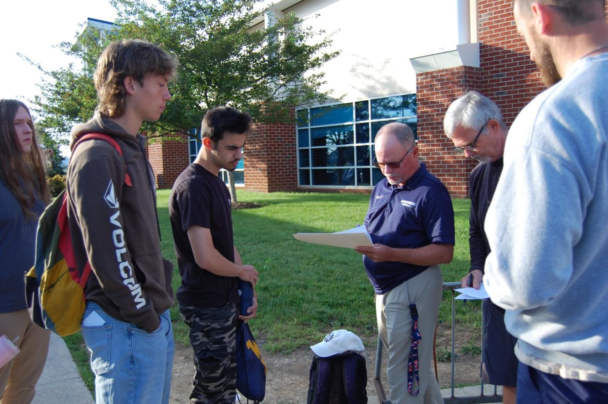 Students get checked off by chaperones and teachers.