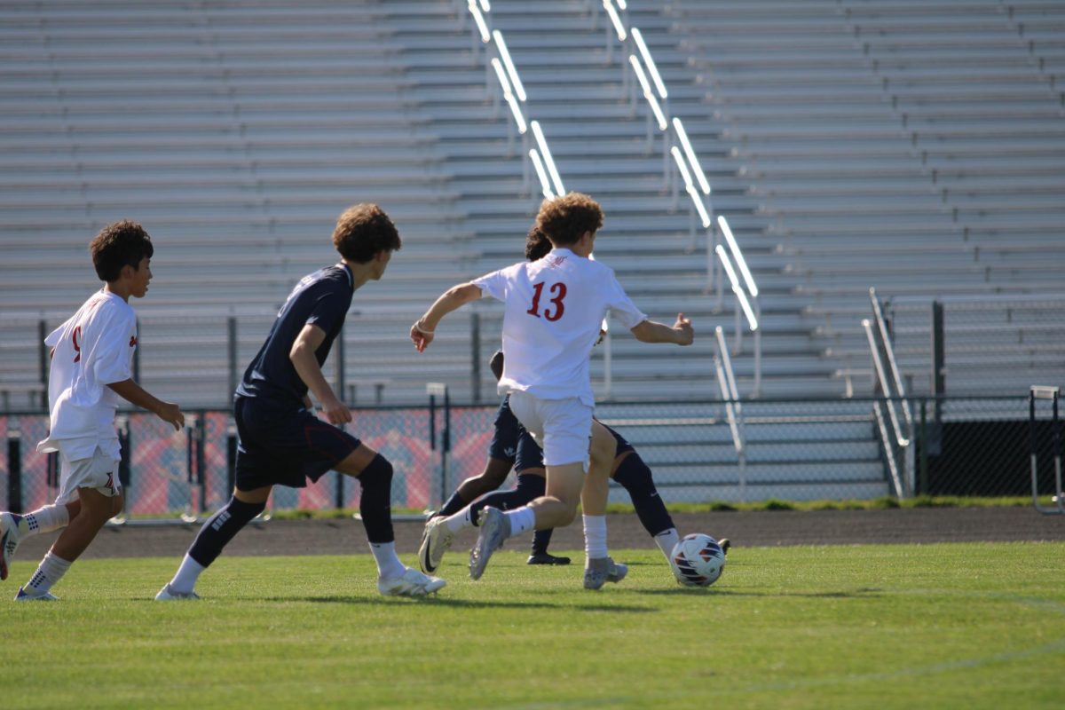 Players trying to defend the ball from the Raptors.