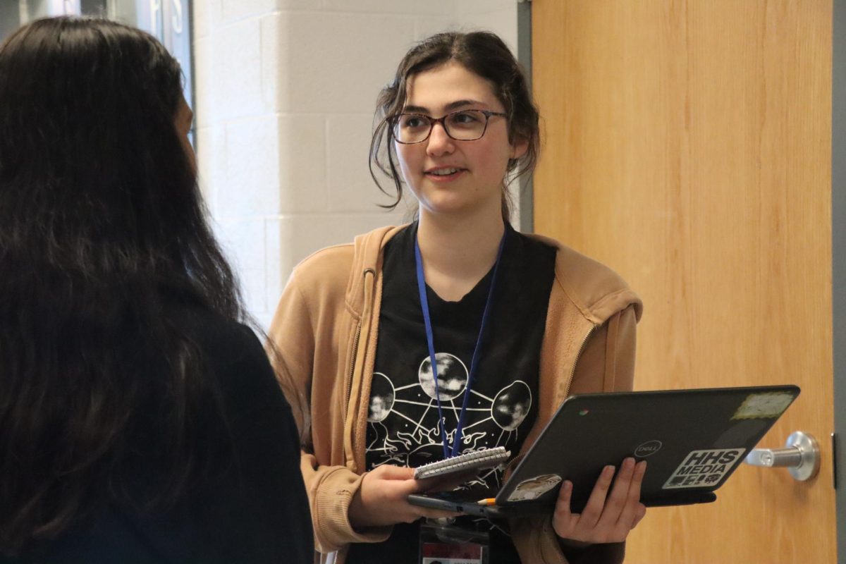 Sophomore Katie Bush interviews Freshman Brianna Aceituno about summer plans.