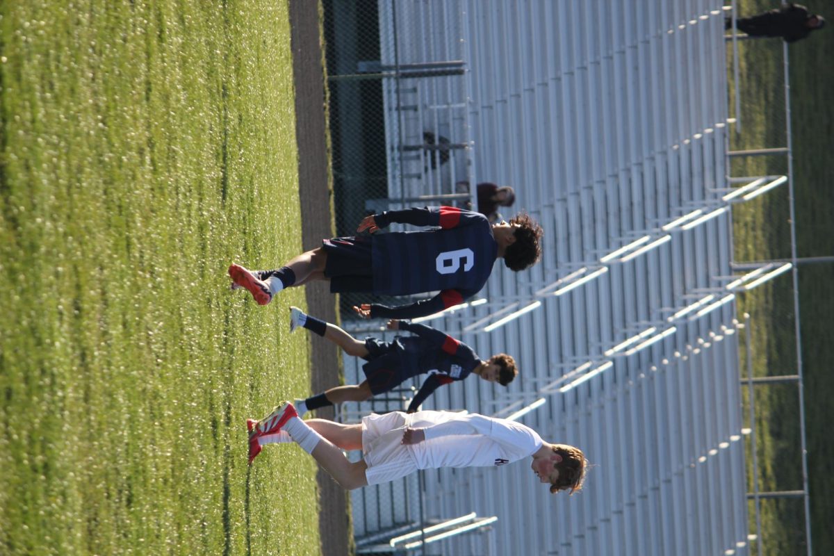 In a tense moment near the goal, Michael Hernandez Castro, #6 clears the ball with a strong kick. Hernandez Castro showed great defensive awareness.