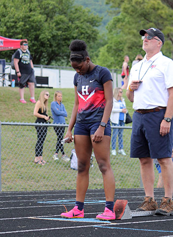 Junior Mariah Etienne preparing herself to race.