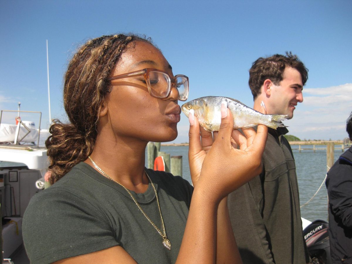 Sophomore Kaylen De Los Santos Medina kisses a fish used as bait. 