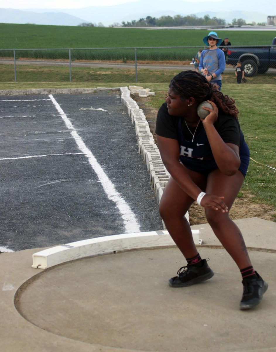 Emanuela Akotiate is a sophomore here at HHS. She is the #1 disc thrower and #2 shot put thrower here at HHS. She always tries her best even on an off day.
