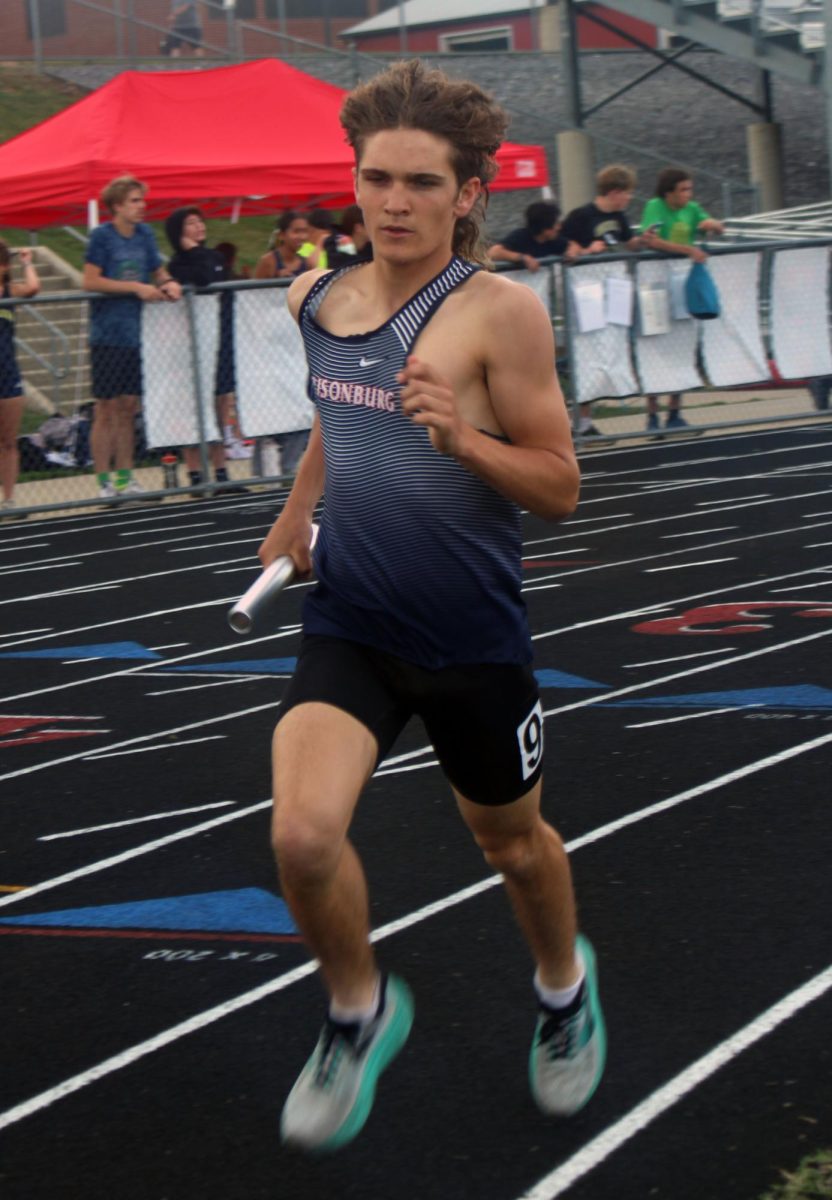 Wesley Swartz is a sophomore here at HHS. He is always running and you will never catch him slacking off. He's running the 4x800 in this, in hopes of winning.