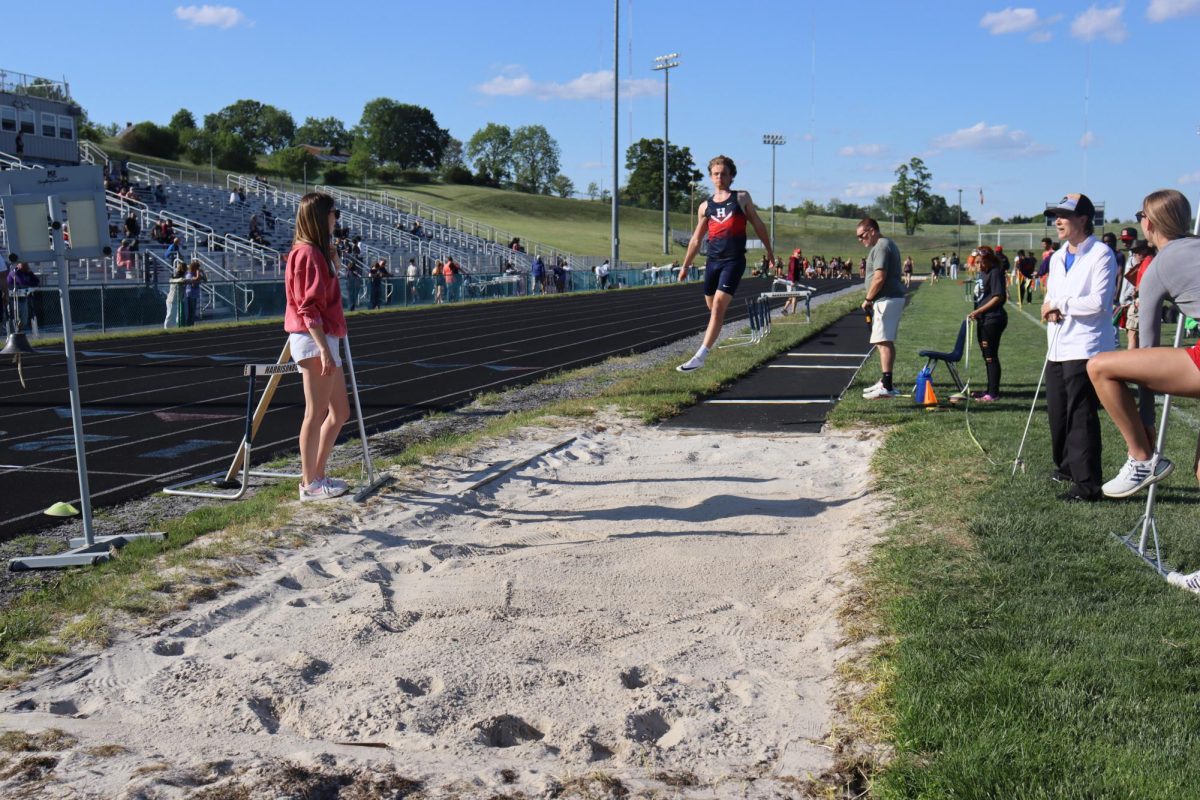 Lucas mid takeoff into his jump.