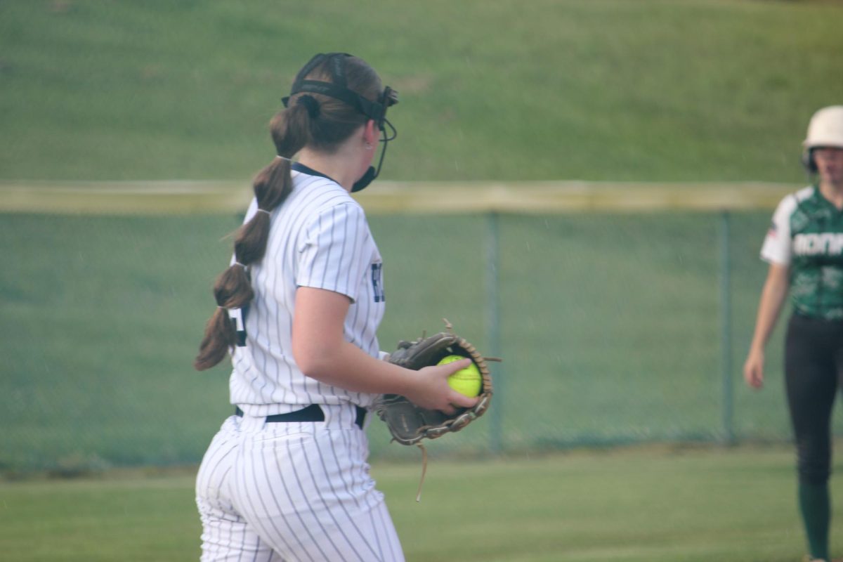  Delaney Dayton is getting ready to pitch. Her fast and strong pitches its hard to hit and strikes the girls out.  