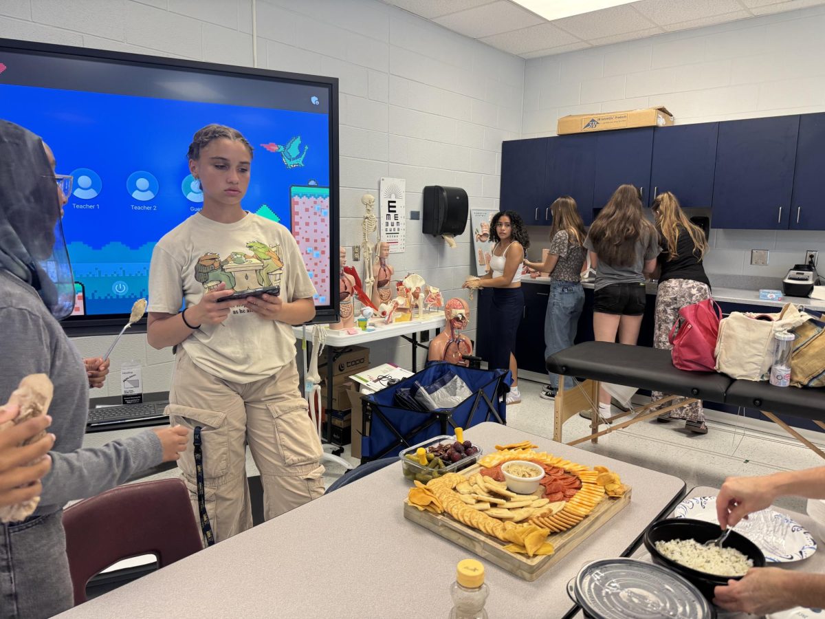 Intro to Healthcare brought food for their nutrition unit. 