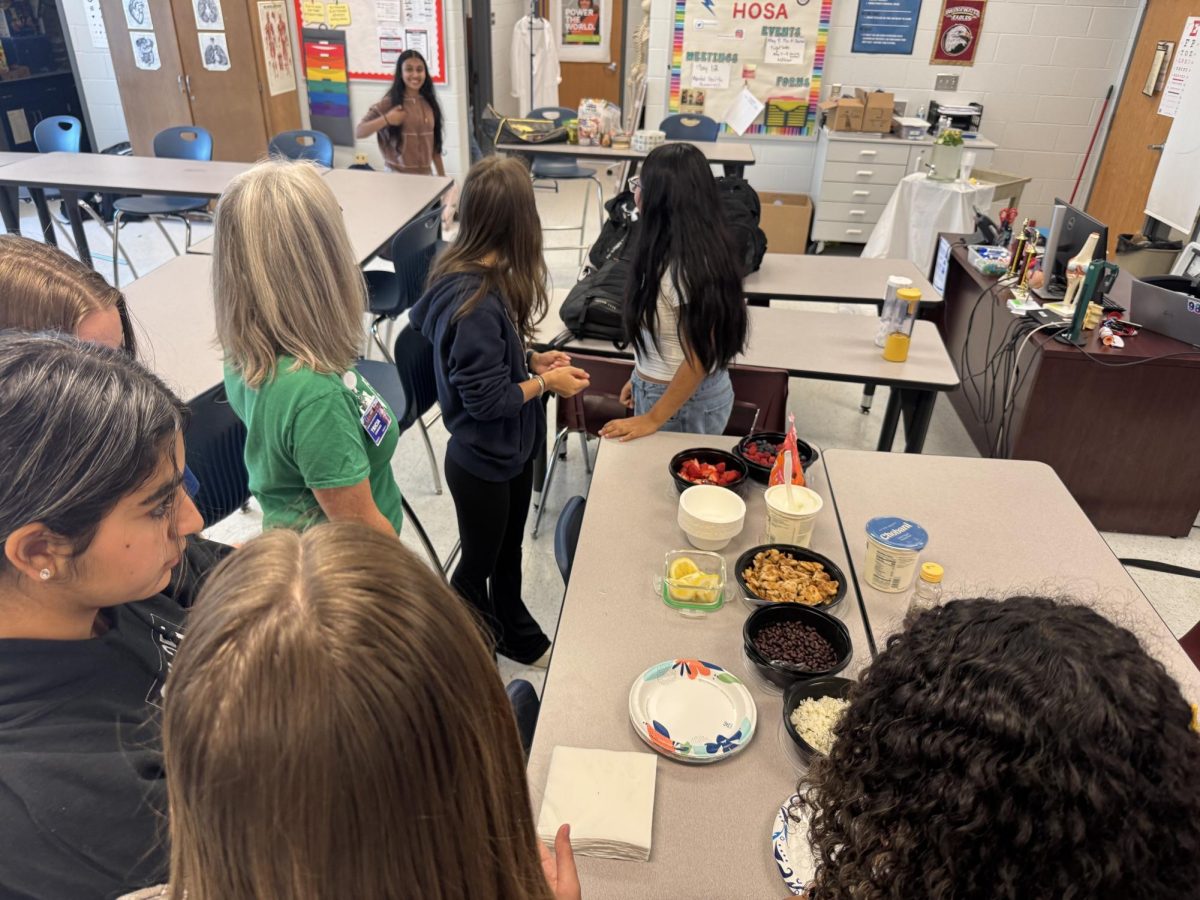 Intro to Healthcare brought food for their nutrition unit. 